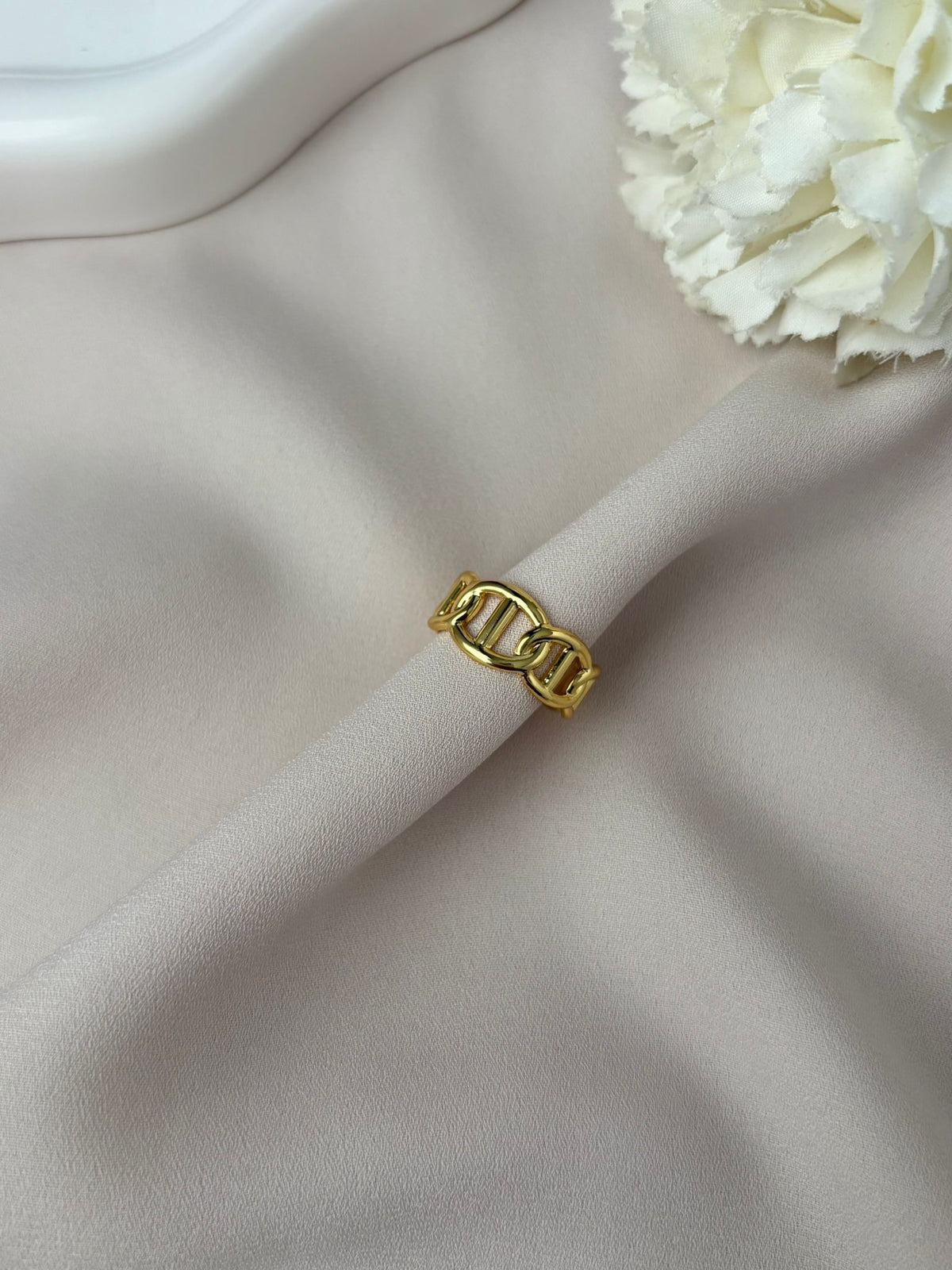 Bague femme dorée motif maille marine